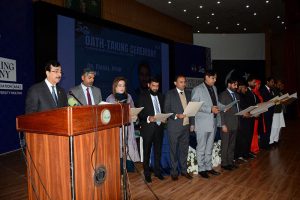 Chairman Senate Syed Yousaf Raza Gillani administers the oath to the newly elected body of the Academic Staff Association at Bahauddin Zakariya University