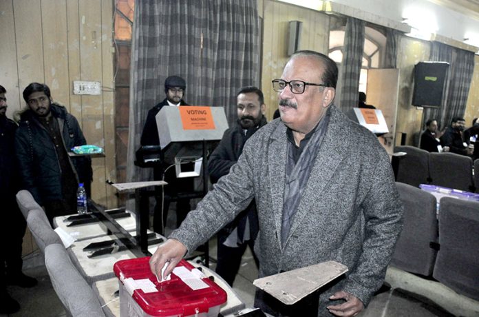A lawyer casts his vote at the District Bar during the annual election