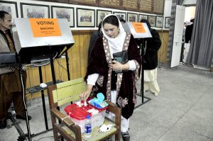 A lawyer casts his vote at the District Bar during the annual election