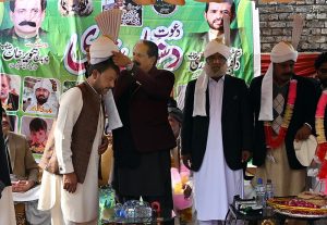 Pakistan Muslim League–Nawaz (PML-N) Senator Chaudhary Tanvir Khan administers the oath to newly elected members of Qadir Bakhsh Rajput Welfare Society at Chaklala Scheme-3