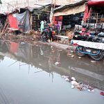 A view of stagnant rain water accumulated on Girls College Road after rain in the city.