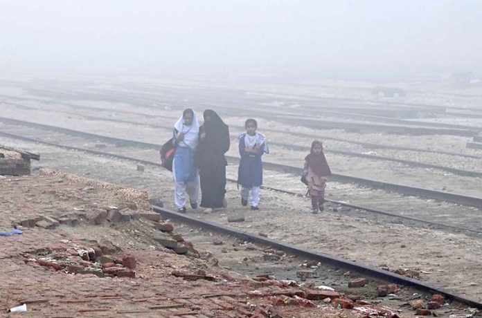 A view of thick fog that engulfs the whole city during morning time