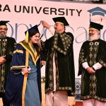 Sindh Minister for Universities & Boards Muhammad Ismail Rahoo awards a gold medal to a successful student during the 23rd convocation 2026 at Isra University