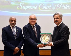 The Hon'ble Chief Justice of Pakistan, Mr. Justice Yahya Afridi, being presented with a souvenir by Mr. Farhan Aziz Khawaja, Director General, Civil Service Academy, who led the delegation of the 53rd Common Training Program, at the Supreme Court of Pakistan.