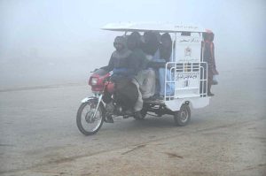 A view of thick fog that engulfs the whole city during morning time