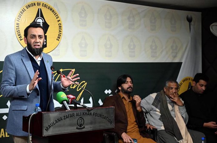 Federal Minister for Information and Broadcasting, Attaullah Tarar addressing during the oath taking ceremony to the Pakistan Federal Union of Columnist and creators (PFUCC) at Maulana Zafar Ali khan Foundation