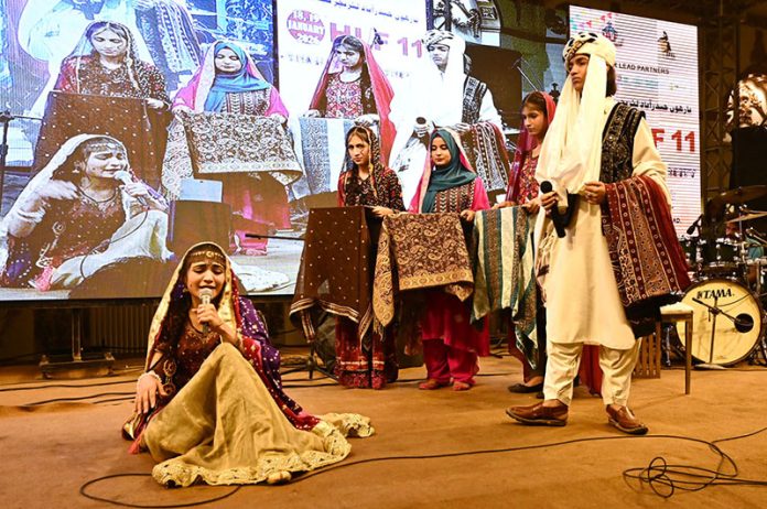 Students performing during inauguration ceremony of 11th Hyderabad Literature Festival at Global Palace bypass