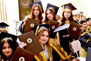 Successful students display their degrees during the 23rd convocation 2026 at Isra University