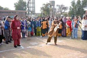 Vice Chancellor Prof. Dr. Kanwal Ameen (T.I), GCWUF, plays the shot to inaugurate the Annual Sports Festival at the Sports Ground of Government College Women University Faisalabad (GCWUF).