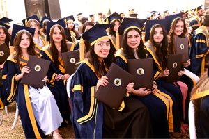 Successful students display their degrees during the 23rd convocation 2026 at Isra University