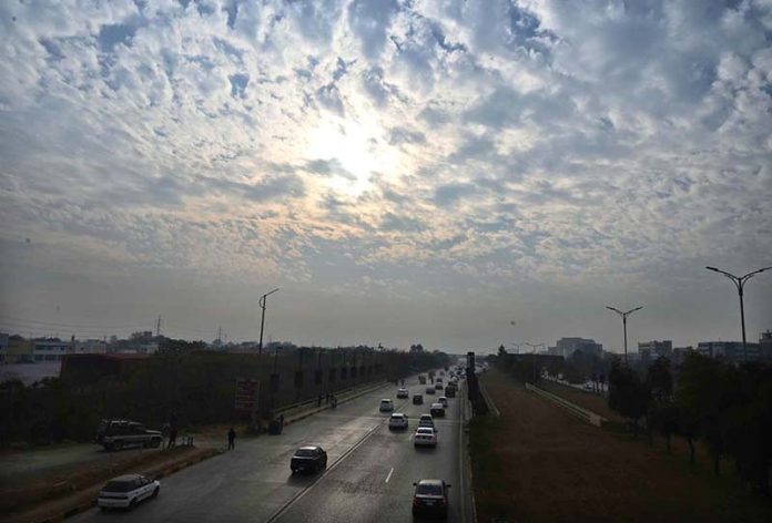 An eye catching scene of thick clouds blanket the sky, blocking sunlight that hints at rain in the federal capital