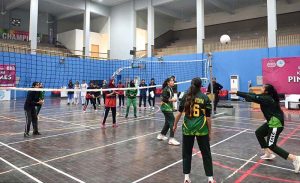 Players undergo volleyball trials during the “Khelta Punjab Pind Games Trials” held at a sports gymnasium, organized by the Sports Department.