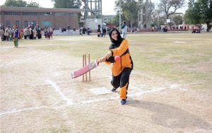 Vice Chancellor Prof. Dr. Kanwal Ameen (T.I), GCWUF, plays the shot to inaugurate the Annual Sports Festival at the Sports Ground of Government College Women University Faisalabad (GCWUF).