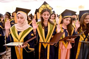 Successful students display their degrees during the 23rd convocation 2026 at Isra University