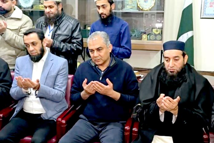 Interior Minister Mohsin Naqvi Federal Minister for Information and Broadcasting Attaullah Tarar offer fateha on the death of Maulana Hafiz Fazlur Rahim at Jamia Ashrafia