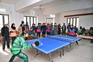 Players in action in table tennis match during Intercollegiate Table Tennis Tournament organized by Board of Intermediate and Secondary Education Sargodha.