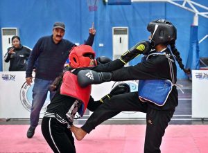 Players compete in wushu trials during the “Khelta Punjab Pind Games Trials” held at a sports gymnasium, organized by the Sports Department.