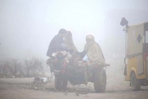 A view of dense fog engulfs the city during the early morning hours.
