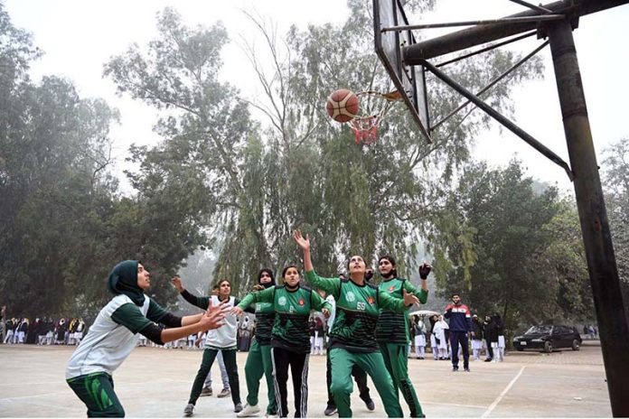 Basketball players attempt to score during the final of the inter-collegiate tournament at Government Group College, Chandni Chowk, where Reader College defeated Superior College to claim victory