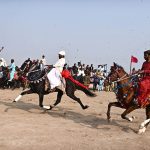 A view of horse racing during all Pakistan horse riding competition winter sports festival 2026 at bypass ground