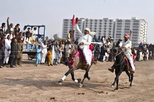 A view of horse racing during all Pakistan horse riding competition winter sports festival 2026 at bypass ground