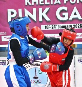 Students participate in boxing trials during the “Khelta Punjab Pink Games Trials” held at the sports gymnasium..