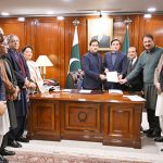 Speaker National Assembly Sardar Ayaz Sadiq hands over the official notification of the appointment of the Leader of the Opposition in the National Assembly to a delegation of opposition members at Parliament House in the federal capital
