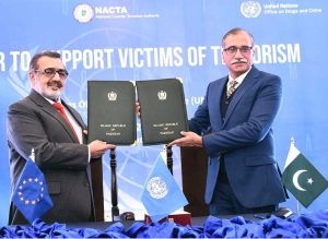 Managing Director Pakistan Bait-ul-Mal Senator Capt. Shaheen Khalid Butt and National Coordinator, NACTA Jawad Ahmad Dogar signing an MoU aimed at assisting victims of terrorism, in a seminar organized by the United Nations Office on Drugs and Crime in Islamabad
