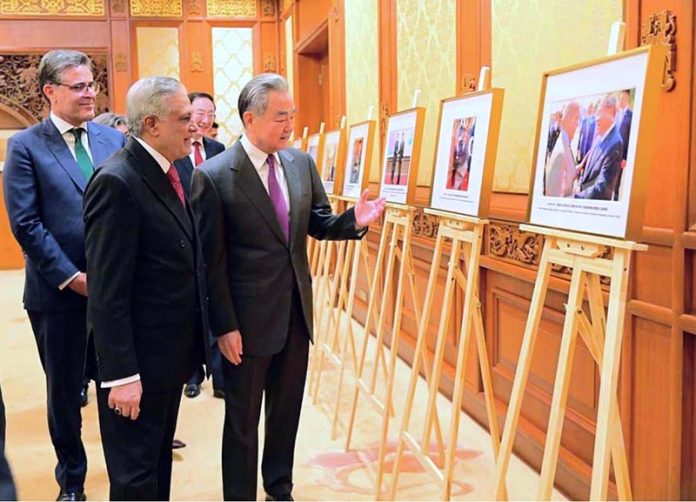 Deputy Prime Minister and Foreign Minister Senator Mohammad Ishaq Dar, together with Chinese Foreign Minister Wang Yi, viewed a special photo exhibition tracing 75 years of Pakistan-China friendship