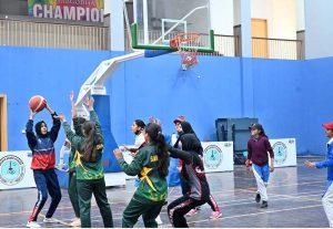 Students participate in boxing trials during the “Khelta Punjab Pink Games Trials” held at the sports gymnasium..