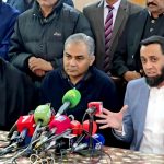 Federal Minister for Information and Broadcasting Attaullah Tarar along with Interior Minister Mohsin Naqvi talks to media personnel at Jamia Ashrafia
