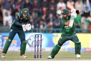 Pakistani batter Usman Khan playing shot during the first Twenty20 International Cricket match between Pakistan and Australia at the Gaddafi Cricket Stadium.
