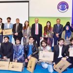 Federal Minister for Climate Change and Environmental Coordination Dr. Musadik Malik addresses the Laptop Distribution Ceremony at COMSATS University, Islamabad