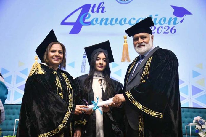 Vice Chancellor QAU Dr Niaz Ahmad along with Principal Prof Rozina Faheem awarding degree to student in 4th Convocation of Institute of Home Economics Art and design college F11