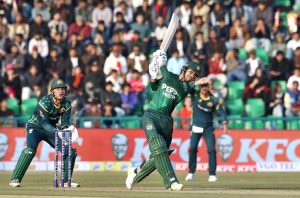 Pakistani batter Usman Khan playing shot during the first Twenty20 International Cricket match between Pakistan and Australia at the Gaddafi Cricket Stadium.