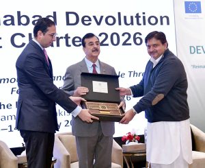 A souvenir being presented to Acting President, Syed Yousuf Raza Gilani at the Islamabad Devolution Summit 2026