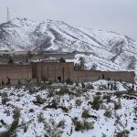 A scenic view of snow-covered mountains