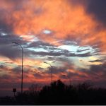 A fiery display of orange and red clouds lit up the sky during a recent sunset, casting striking silhouettes over the urban landscape of the Federal Capital