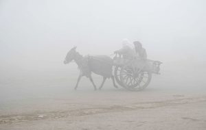 A view of thick fog that engulfs the whole city during morning time