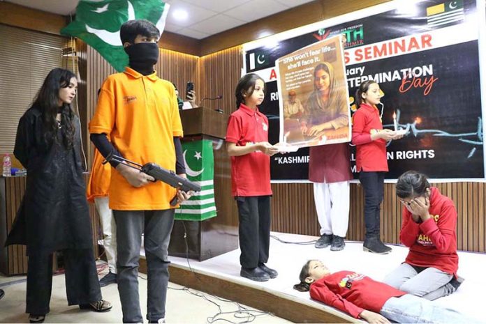 Students perform a tableau on the occasion of Kashmir’s Right to Self-Determination Day (January 5) titled “Kashmir: A Global Human Rights Commitment,” organized by Desire for Freedom Youth Forum for Kashmir