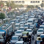 Traffic remains gridlocked on National Stadium Road amid peak-hour congestion.