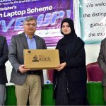 Vice Chancellor of Allama Iqbal Open University, Prof. Dr. Nasir Mahmood, distributes laptops to students under the Prime Minister’s Youth Laptop Scheme at the Regional Campus Gujranwala
