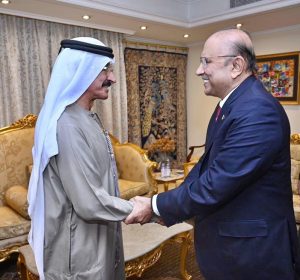 President Asif Ali Zardari shaking hands with Sultan Ahmed bin Sulayem, Group Chairman and Chief Executive Officer of DP World.
