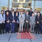 A group photograph of Federal Secretary Commerce Jawad Paul and Secretary of the Ministry of National Food Security and Research (MNFS&R), Amir Mohiuddin, with exporters at the Chamber of Commerce