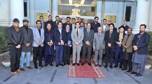 A group photograph of Federal Secretary Commerce Jawad Paul and Secretary of the Ministry of National Food Security and Research (MNFS&R), Amir Mohiuddin, with exporters at the Chamber of Commerce