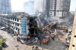 Rescue workers continue to search for missing people in the rubble of Gul Plaza, which collapsed after a devastating fire broke out, killing more than 60 people and leaving dozens missing under the rubble