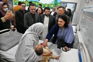 Chairperson, Benazir Income Support Programme (BISP), Senator Ms. Rubina Khalid, poses for a group photo with participants after inaugurating the Nutrition Stabilization Center supported by BISP and WHO at Bacha Khan Medical Complex