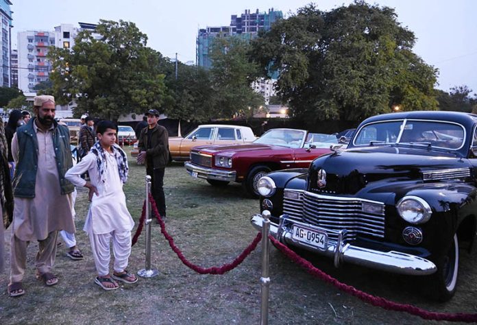 Visitors show keen interest during the Antique Car Show at Frere Hall
