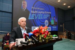 Federal Minister for Industries and Production Rana Tanveer Hussain and University of Sargodha Vice Chancellor Prof. Dr. Qaiser Abbas distribute laptops to students during the Prime Minister Laptop Scheme Regional Distribution Ceremony at the University of Sargodha