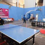 Students participate in table tennis trials during the “Khelta Punjab Pink Games Trials” held at the sports gymnasium.